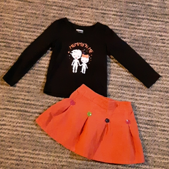 orange skirt with black top